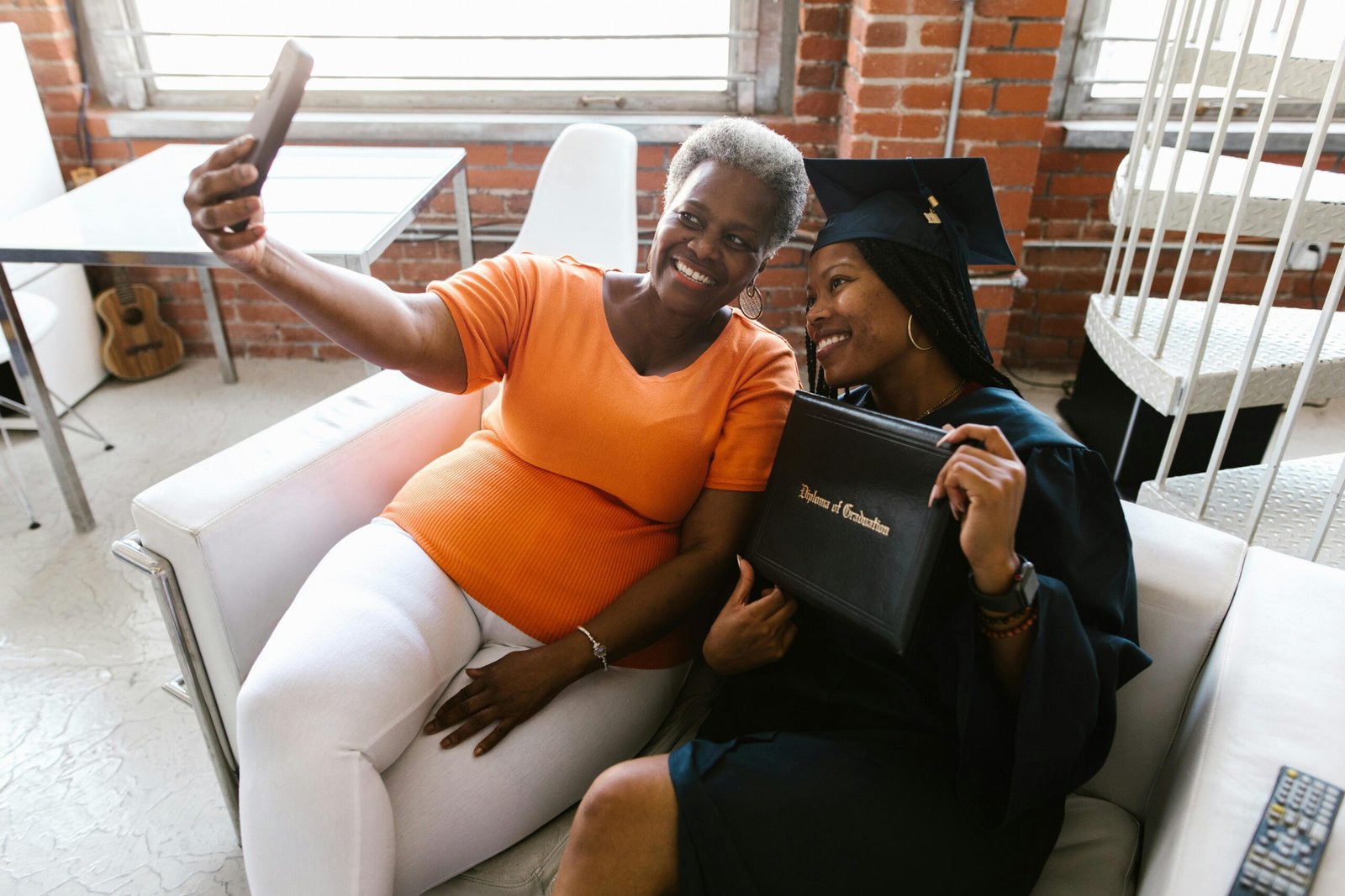Mother Taking Selfie with Graduate Daughter